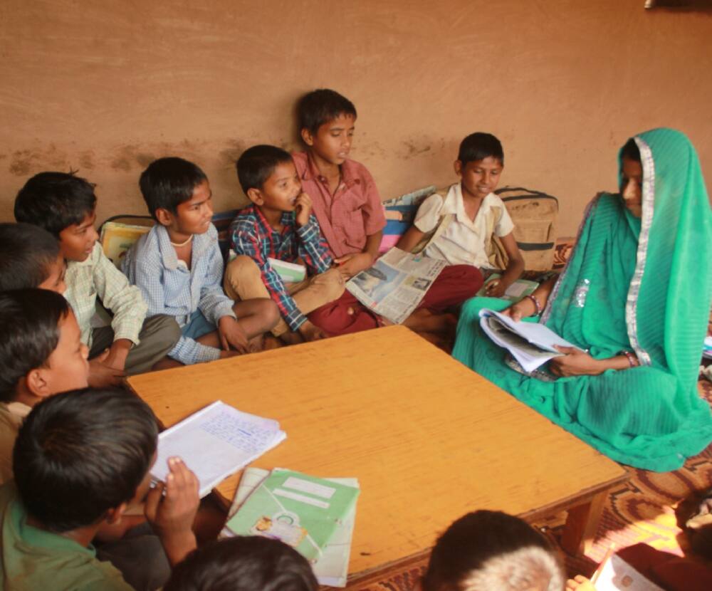 Children studying in a rural village in India Children studying in a rural village in India