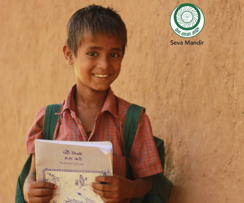 A young boy in school uniform with a bright smile A young boy in school uniform with a bright smile