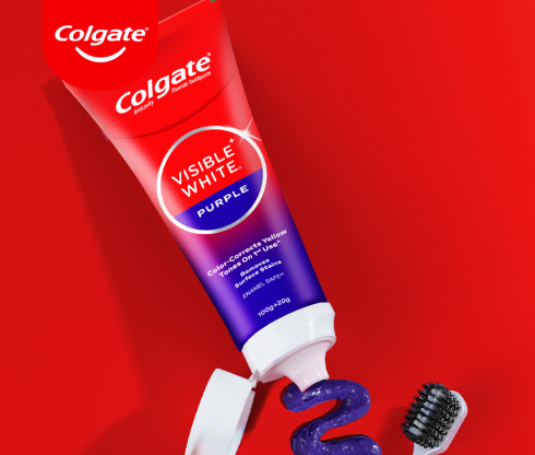 Squeeze some Colgate Visible WhitePurple toothpaste onto your brush, and begin.