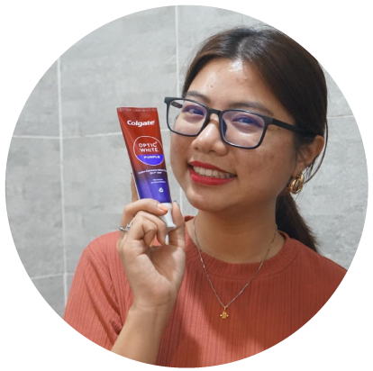 A young girl with Colgate Optic White Purple Toothpaste