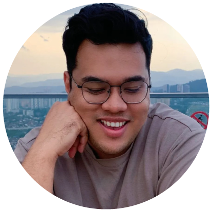 A young man smiling after using Colgate Optic white Purple Toothpaste