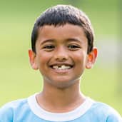 7 to 8 years kid with football team on the back 