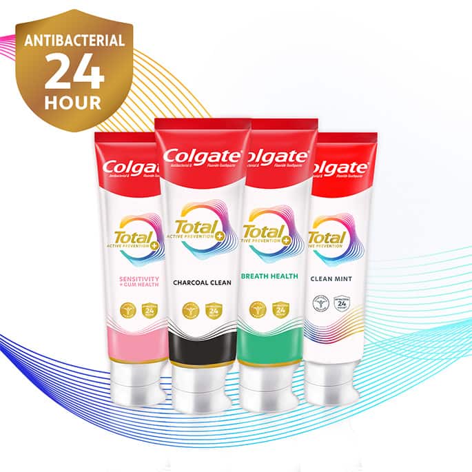 Women smiling Colgate Total