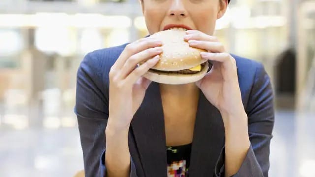 woman avoiding soda by eating healthy food for oral health growth
