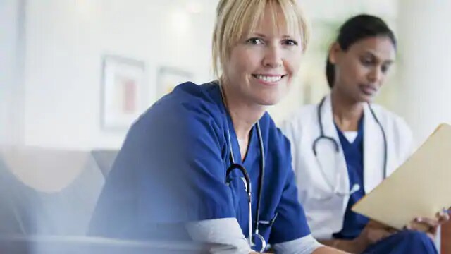 dentist speaking with patient about their dental health dentist speaking with patient about their dental health