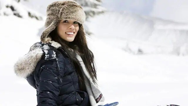 woman smiling after consulting with dentist about teeth whitening