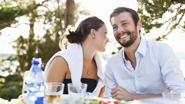 couple smiling after having their teeth whitened