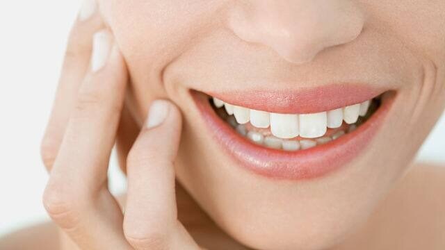 woman smiling with newly whitened teeth
