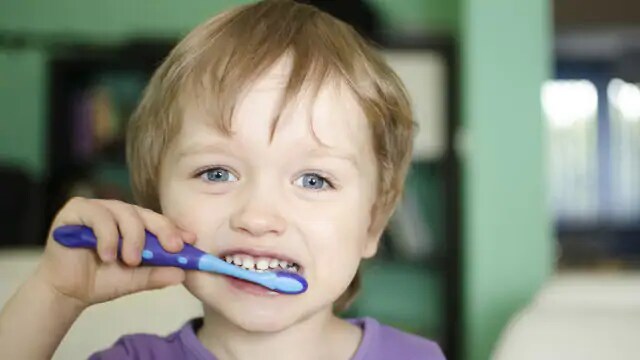 Kid Brushing with Personalized Toothbrush