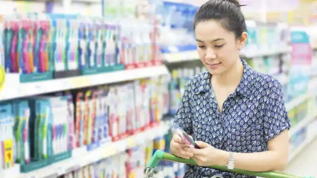 Woman Selecting a Mouthwash