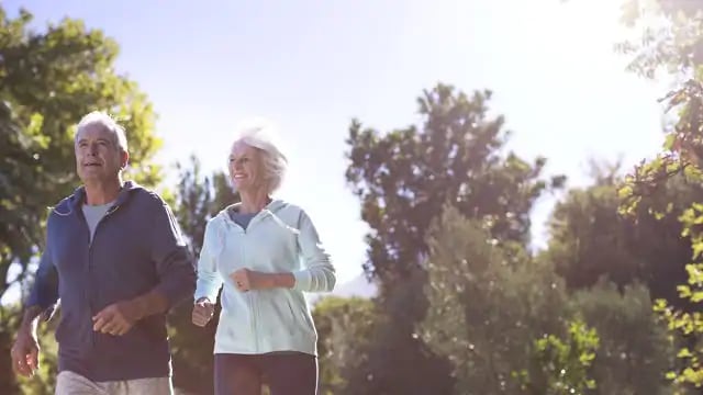 dentist talking to patient about plaque buildup