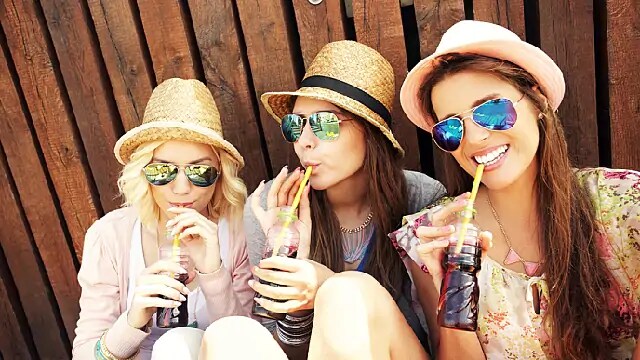 women drinking teeth friendly beverages