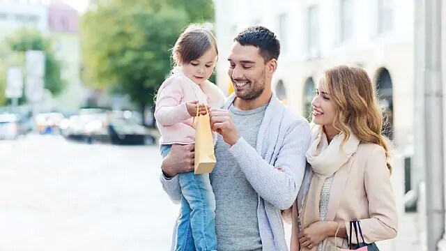 A happy family is shopping together