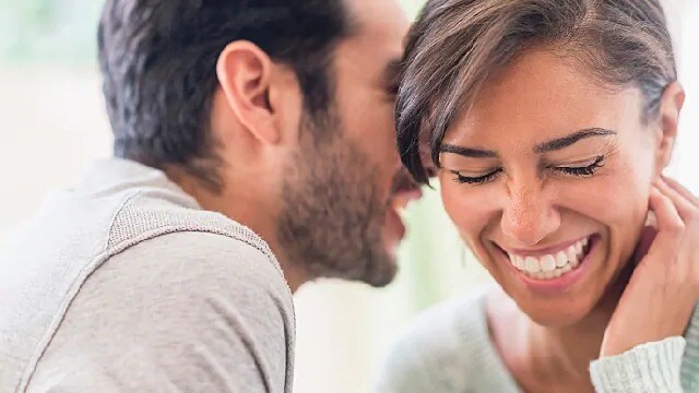 couple smiling after orthodontic treatment