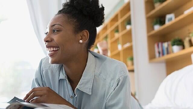 woman smiling after dry socket care