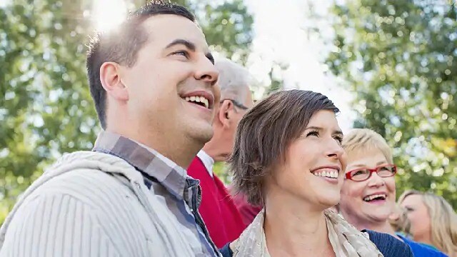 couple with clear retainers smiling