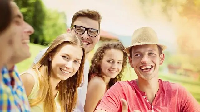 people smiling after having a frenectomy