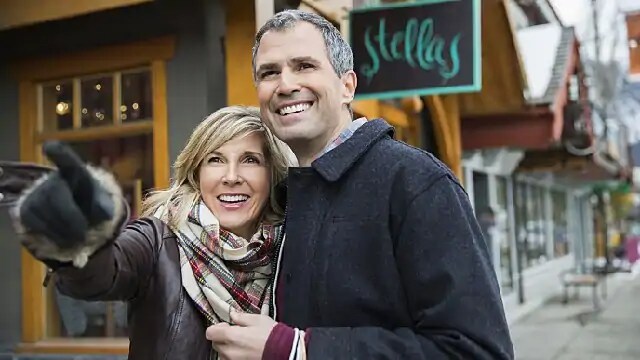 husband and wife smiling together