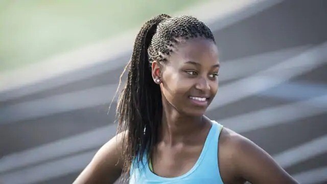 girl smiling after having braces removed