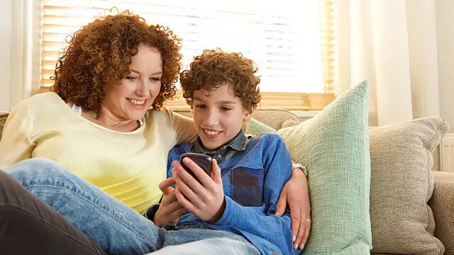 parent and child reading about cryptic tonsils