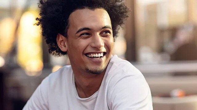 man smiling after dental treatment