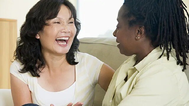women laughing together