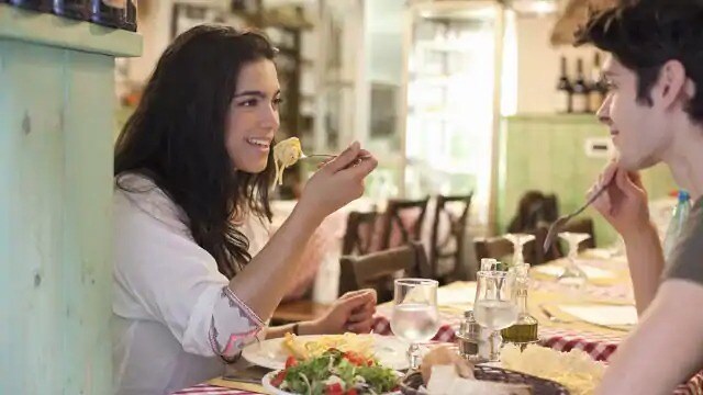 woman eating pasta