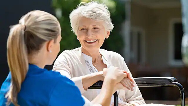 An old lady is happy after being treated for MRSA infections