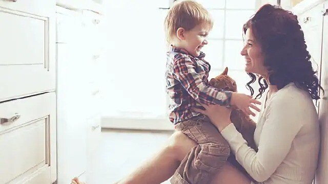mother is telling her son how to treat common oral diseases