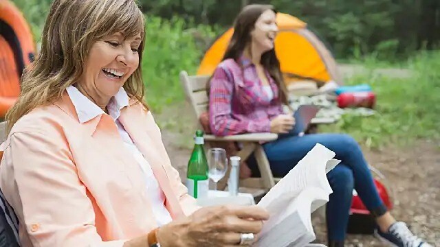 woman with flipper dentures smiling