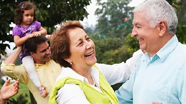 woman smiling with mini dental implants