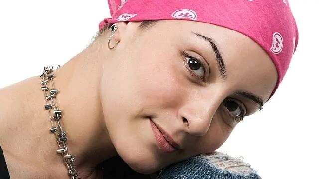 a woman with a pink bandana