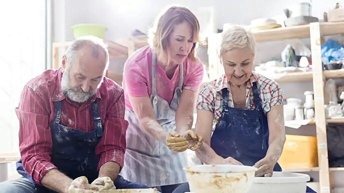 people taking a ceramics class