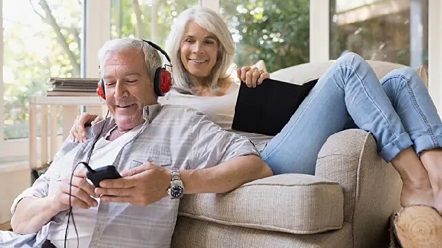 older couple relaxing on couch