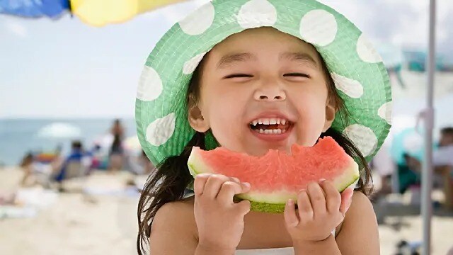girl eating watermelon