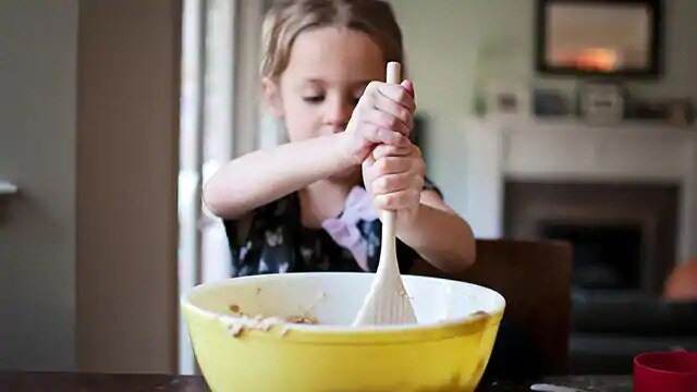 girl stirring batter