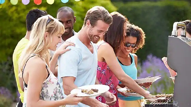 family eating at a bbq