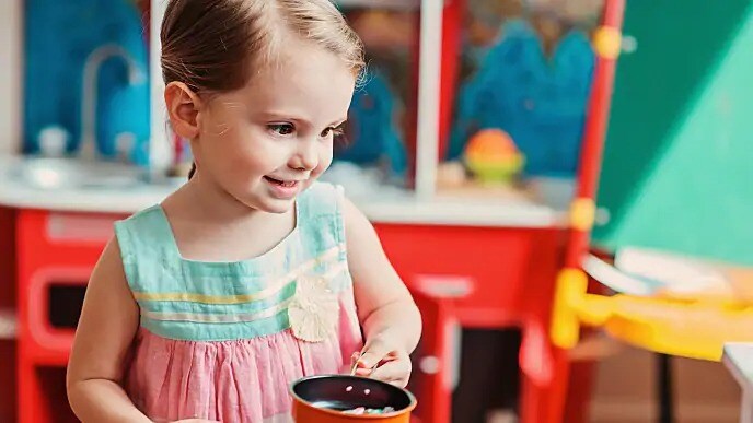 Child with mamelons teeth smiling