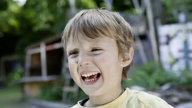 Young child laughing