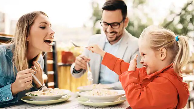 family laughing after visiting the dentist