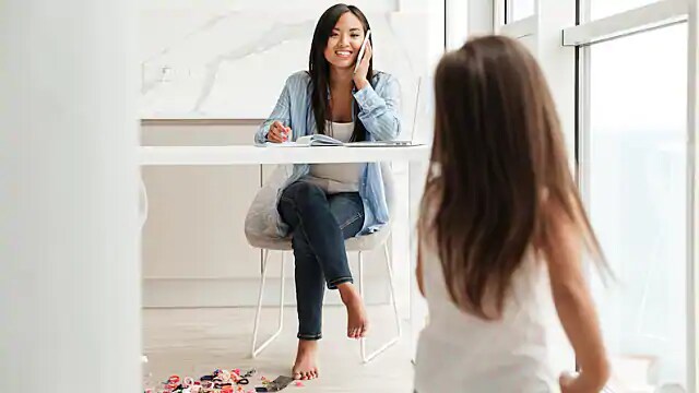 mom on phone with dentist