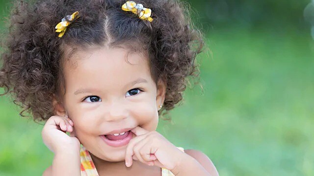 small child with teeth starting to come in