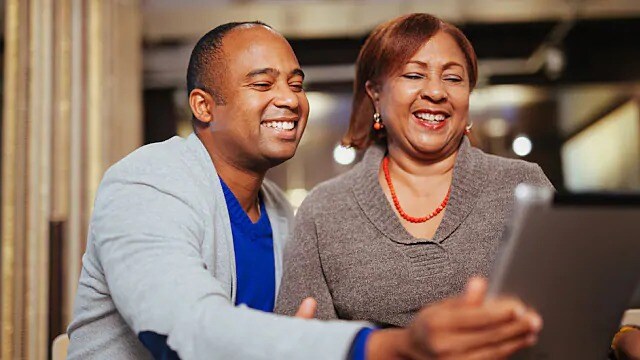 couple smiling using their levator anguli oris