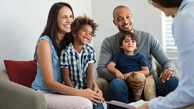 parents with children at dentist