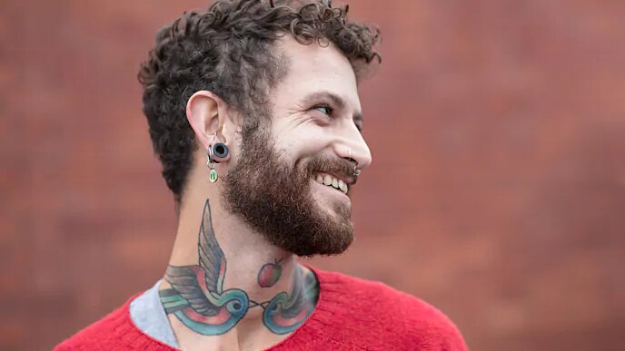 man with gum piercing