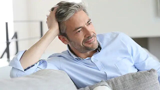 man speaking with dentist about erythroplakia