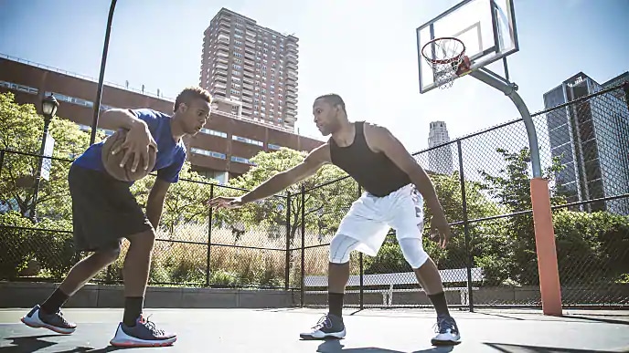 men playing basketball