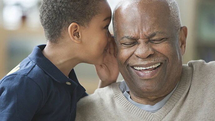 grandfather and grandson laughing