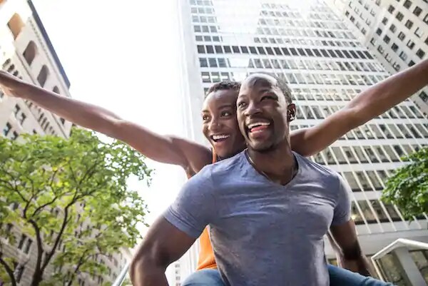 couple smiling together outside
