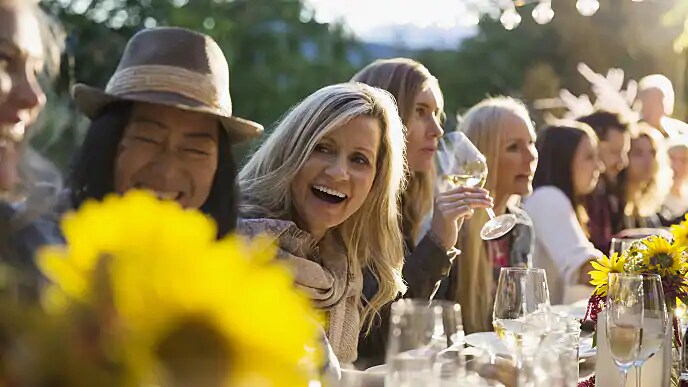 woman smiling at dinner